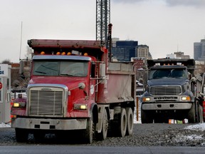 Dump trucks at a Montreal construction site in 2011.