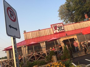 New parking signs went up in front of Smoke Meat Pete's in Ile-Perrot on Aug. 26.