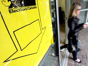 A voter leaves a polling station on May 2, 2011 after casting a ballot in Canada's federal election.