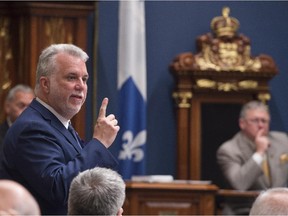Quebec Premier Philippe Couillard responds to Opposition questions on Thursday, June 11, 2015 at the legislature in Quebec City.
