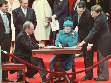 The Queen signs Canada’s constitutional proclamation in Ottawa on April 17, 1982 as Prime Minister Pierre Trudeau looks on. With the stroke of a pen by the Queen in Ottawa, Canada had its own Constitution, one of the many notable dates in the history of the country. Canada marked its 147th birthday July 1 that year.