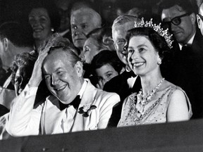 Queen Elizabeth II and Prime Minister Lester B. Pearson enjoy a laugh together, during a visit to Canada in 1967.