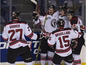 Québec Remparts players celebrate the first goal scored by Jerome Verrier the against Rimouski Oceanics during first period action Thursday, May 28, 2015, at the Memorial Cup in Quebec City.