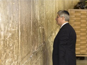 Canadian Prime Minister Stephen Harper stands in front of the Western Wall, the site where Jews can pray in Jerusalem's old city.