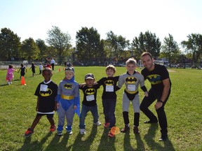 Students from Kindergarten through Grade 3 at Nesbitt Elementary School, with spiritual community animator Vince Lacroce, dressed up as superheroes on Sept. 17, 2015 in honour of the 35th year of the Terry Fox Run.