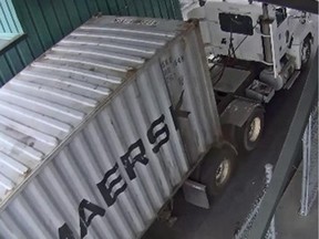 Surveillance camera at Port of Montreal captures a container being taken away on Sept. 2, 2015. Montreal police investigated the disappearance of the container as a theft, and said it contained $10 million worth of silver.