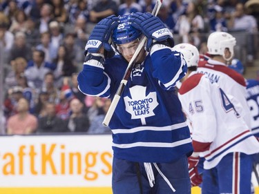 Toronto Maple Leafs' T.J. Brennan reacts after missing an open net during second period pre-season exhibition NHL hockey action against the Montreal Canadiens in Toronto on Saturday, September 26, 2015.