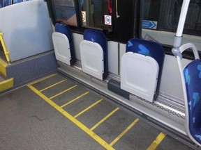 The STM is removing two fixed, front-facing seats from 30 buses and replacing them with two fold-down side-facing seats.