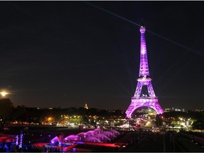 The Eiffel Tower in Paris is illuminated with a pink light, as part of the 'Ruban Rose' event  during the 22nd campaign against breast cancer, in honour of National Breast Cancer Awareness Month in October.