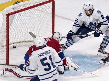 Toronto Maple Leafs' William Nylander, right, scores past Montreal Canadiens goalie Zachary Fucale during second period NHL pre-season hockey action Tuesday, September 22, 2015, in Montreal.