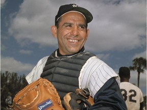 File-New York Yankee catcher Yogi Berra poses at spring training in Florida, in an undated file photo. Berra, the Yankees Hall of Fame catcher has died. He was 90.