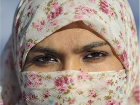 Zunera Ishaq, who wants to be allowed to wear her Niqab during the Canadian citizenship ceremony, poses near home home in Mississauga, Ont. on Monday February 16, 2015.