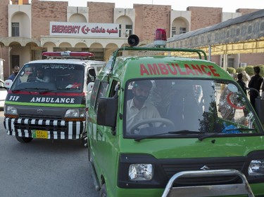 Ambulances are parked outside an emergency ward of a Pakistani hospital to respond to an earthquake, Oct. 26, 2015. A powerful 7.7-magnitude earthquake in northern Afghanistan rocked cities across South Asia.