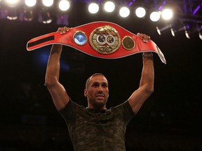 Boxer James Degale poses with his IBF Super Middleweight title belt at The O2 Arena on May 30, 2015 in London, England.