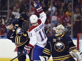 Canadiens right-winger Brendan Gallagher celebrates a goal by Andrei Markov, as Sabres defenceman Josh Gorges and goaltender Chad Johnson react during second period Friday, Oct. 23, 2015 in Buffalo.