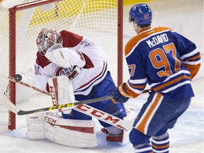 Canadiens goalie Carey Price makes the save on Oilers rookie Connor McDavid during second period in Edmonton on Thursday.