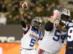 Alouettes quarterback Kevin Glenn (5) throws during first half of CFL football action against the Argonauts in Hamilton on Friday, October 23, 2015.