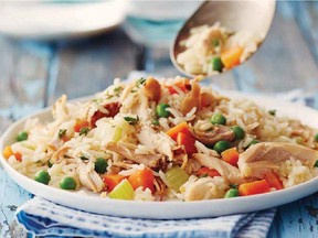 A meal-in-one dish starts with a rotisserie-cooked chicken that is then combined with vegetables and rice. Add a tossed green salad and crusty bread.