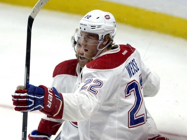 Montreal Canadiens' Dale Weise (22) celebrates his goal against the Ottawa Senators during the first period of a pre-season NHL hockey game, Saturday October 3, 2015, in Ottawa.