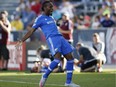 Montreal Impact forward Didier Drogba celebrates after making penalty kick against Colorado Rapids in the first half of an MLS soccer match in Commerce City, Colo., Saturday, Oct. 10, 2015.