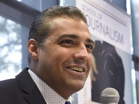 Canadian journalist Mohamed Fahmy addresses a news conference hosted by Canadian Journalists for Free Expression at Ryerson University in Toronto, Tuesday, Oct.13, 2015.