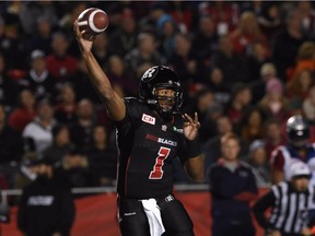 Ottawa Redblacks quarterback Henry Burris throws the ball while taking on the Montreal Alouettes in second quarter CFL action in Ottawa on Thursday, Oct 1, 2015.