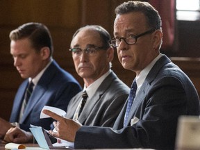 James Donovan (Hanks), an insurance lawyer, reluctantly agrees to defend KGB agent Rudolf Abel (Mark Rylance), centre.