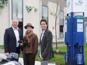 Lachine borough Mayor Claude Dauphin, pictured left, with Lachine resident Myriam Pelland and GRAME director Jonathan Theoret. The trio stand near one of two charging stations for electric cars installed at the Saul Bellow Library. Photo courtesy of the borough of Lachine. Entered by Kathryn Greenaway, Oct. 26, 2015