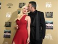 Taylor Kinney looks for another slap from fiancée Lady Gaga.