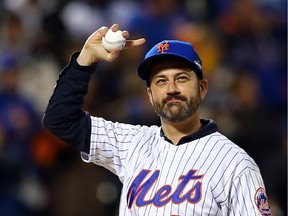 Late-night host Jimmy Kimmel waves to the crowd prior to his first pitch before Game 2 of the 2015 MLB National League Championship Series between the Chicago Cubs and the hosting New York Mets.
