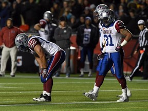 Montreal Alouettes react to a third quarter touchdown by the Ottawa Redblacks during CFL action in Ottawa on Thursday, Oct 1, 2015.