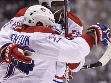 Montreal Canadiens' Alex Galchenyuk (27) celebrates his goal against the Toronto Maple Leafs with teammate P.K. Subban during third period NHL action in Toronto on Wednesday, Oct. 7, 2015.