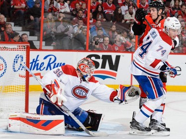 Goaltender Mike Condon #39 of the Montreal Canadiens gets the glove out during the NHL game against the Ottawa Senators at Canadian Tire Centre on October 11, 2015 in Ottawa.