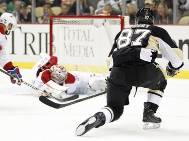 Sidney Crosby (#87) of the Pittsburgh Penguins shoots the puck on nets in the third period during the game against Carey Price (#31) of the Montreal Canadiens at Consol Energy Center on October 13, 2015 in Pittsburgh, Pennsylvania.