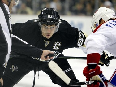 Sidney Crosby (#87) of the Pittsburgh Penguins awaits the face-off during the game against the Montreal Canadiens at Consol Energy Center on October 13, 2015 in Pittsburgh, Pennsylvania.