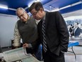 Robert Libman, right, and volunteer Maurice Tietolman at the Conservative campaign office in Mount Royal on Wednesday October 14, 2015, in Montreal, Quebec.