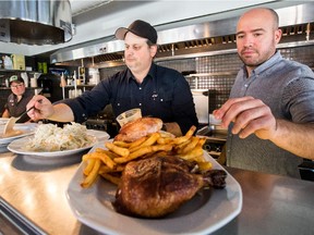 Co-owners Stefano Faita, Mike Forgione and Yann Turcotte prepare to taste the roast chicken platter at Chez Tousignant.