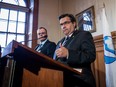 Montreal Mayor Denis Coderre, right, talks at City Hall about the Liberals and Justin Trudeau's victory in the federal election. Left of  Coderre is Mayor of Iles-de-la-Madeleine Jonathan Lapierre.