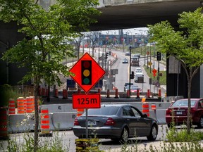 Motorists make their way through a section of St-Jacques Blvd. westbound towards the MUHC earlier this summer.