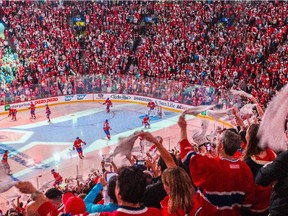 Fans cheer as the Canadiens take the ice at the Bell Centre before the start of playoff game against the Tampa Bay Lightning in Montreal on Sunday, May 3, 2015.