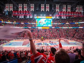 Montreal Canadiens fans cheer as the Canadiens go on the ice before the start of game five of their NHL Eastern Conference semifinal series against the Tampa Bay Lightning at the Bell Centre in Montreal on Saturday, May 9, 2015.