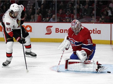 Montreal Canadiens Carey Price makes a pad save as Ottawa Senators Mika Zibanejad waits for the rebound during a National Hockey League pre-season game in Montreal Thursday October 1, 2015.