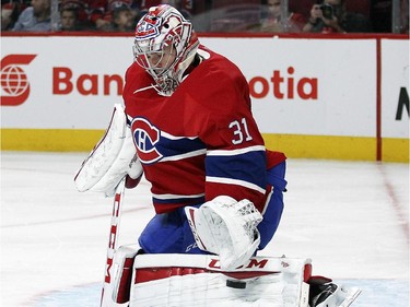 Montreal Canadiens Carey Price makes a pad save during a National Hockey League pre-season game against the Ottawa Senators in Montreal Thursday October 1, 2015.