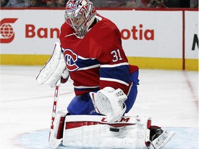 Montreal Canadiens Carey Price makes a pad save during National Hockey League pre-season game against the Ottawa Senators in Montreal Thursday October 01, 2015.