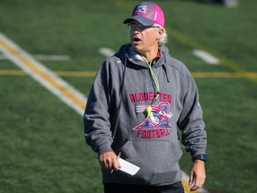 Montreal Alouettes head coach Jim Popp takes part in a team practice at Parc Hebert in Montreal on Saturday, October 10, 2015.