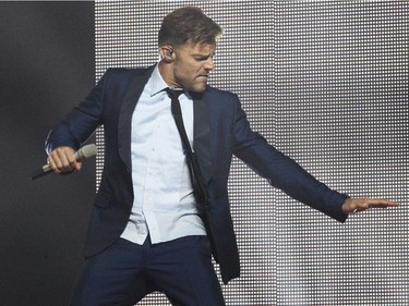 Latin pop singer Ricky Martin performs at the Bell Centre Wednesday, October 14, 2015 in Montreal. The 43-year old is a native of Puerto Rico.