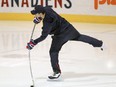 Canadiens goalie Carey Price takes a shot while skating before an optional practice at the team's training facility in Brossard on Oct. 14, 2015.