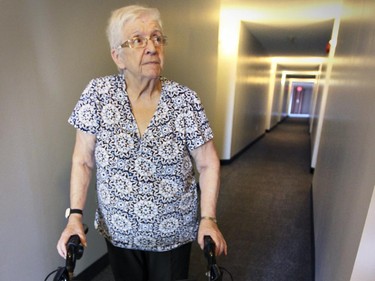 MONTREAL, QUE.: October 15, 2015 -- Agathe Moses, 79, in the hallway of her Cote St-Paul home in a subsidized seniors apartment building in Montreal Thursday October 15, 2015. (John Mahoney / MONTREAL GAZETTE)