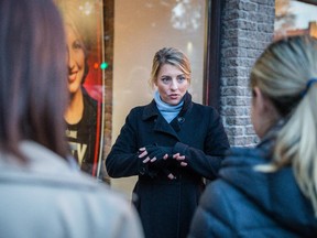 Mélanie Joly, Liberal Party candidate for the riding of Ahuntsic-Cartierville, speaks with supporters outside her campaign headquarters in Montreal on Thursday, Oct. 15, 2015.