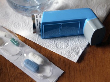 MONTREAL, QUE.: October 15, 2015 -- Pre-packaged medication and an inhaler on the table near the tv in Agathe Moses's Cote St-Paul home in a subsidized seniors apartment building in Montreal Thursday October 15, 2015. (John Mahoney / MONTREAL GAZETTE)